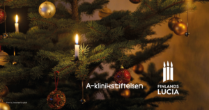 Tunnelmallinen kuva joulukuusesta. Kuvan päällä Lucia-keräyksen ja A-klinikkasäätiön logot.